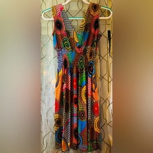 Beautiful, colorful dress; no tags (brand unknown). Super stretchy!